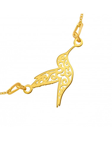 Złota bransoletka z ażurowym kolibrem zdobiona chwostem